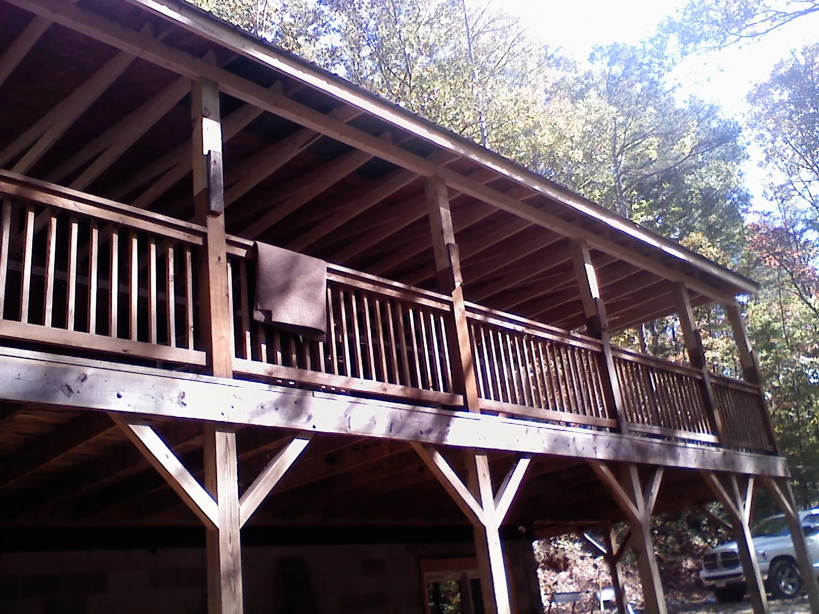 Timber framing under a new elevated porch and deck — Roof Leak Repair in Wells Bridge by Roofing Brothers